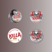 a group of round metal containers with red and white labels